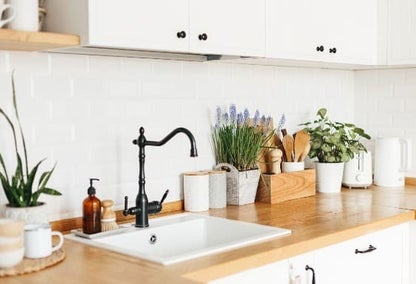 Stylish kitchen with white bricks typical of a home in Thoroughbred Acres, Lexington